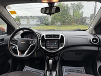 ONE OWNER This 2017 Chevrolet Sonic LT Auto 4dr Hatchback in vibrant orange is sure to turn heads! W... (image 7)
