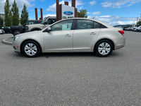 This 2013 Chevrolet Cruze has a Grey exterior and Grey seats with seating for 5. Equipped with a 1.4... (image 2)
