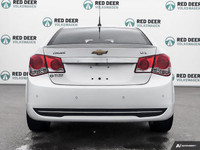 Get behind the wheel of the 2014 Chevrolet Cruze LTZ, a stylish white front-wheel-drive sedan known... (image 5)