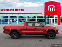Conquer any terrain with this 2023 Toyota Tacoma Crew Cab Pickup. Its robust four-wheel-drive system... (image 6)