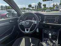 KBB.com 10 Coolest New Cars Under $20,000. This Volkswagen Jetta delivers a Intercooled Turbo Regula... (image 8)