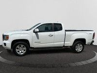 The GMC Canyon can carry up to 1620 pounds of people or cargo, and tow up to 7,000 pounds. White in... (image 1)