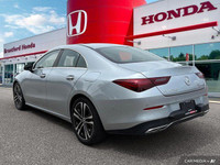 Experience the thrill of effortless performance and sophisticated style behind the wheel of this 202... (image 3)