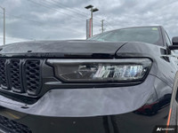 The 2024 Jeep Grand Cherokee L Limited 4x4 in striking Diamond Black Crystal Pearl is a sophisticate... (image 6)