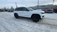 This 2024 JEEP GRAND CHEROKEE LAREDO 4X4 has the following options Capri Leatherette/Suede Seats, Po... (image 1)