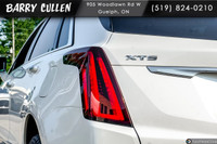 The 2024 Cadillac XT5 AWD Premium Luxury stands out in its stunning white exterior, delivering excel... (image 6)