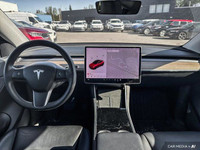 This Tesla Model Y delivers a Electric engine powering this Automatic transmission. Window Grid Ante... (image 9)