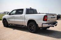 This Ram 1500 has a strong Twin Turbo Regular Unleaded I-6 3.0 L/183 engine powering this Automatic... (image 1)