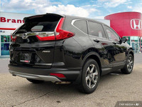 Command the road in this 2018 Honda CR-V EX-L, boasting a sleek Crystal Black Pearl exterior and a s... (image 5)