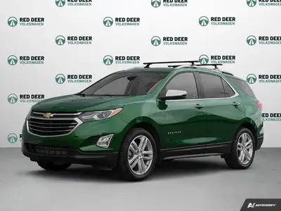 The 2018 Chevrolet Equinox Premier AWD in a striking green finish offers a dependable and confident...