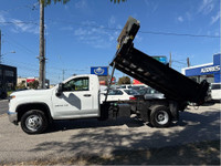 DUMP TRUCK with Hydraulic Lift in excellent condition with a clean carfax and one previous owner. Wi... (image 4)