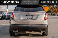 The 2023 Cadillac XT5 FWD Luxury in an elegant tan hue with its nimble front-wheel drive is all abou... (image 5)