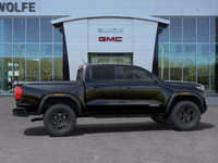 The 2025 GMC Canyon Elevation, cloaked in Onyx Black with a Jet Black interior, is a mid-size truck... (image 9)