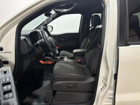 The 2023 Nissan Frontier Pro-4x, available at Moose Jaw Honda, is a robust and reliable truck design... (image 7)