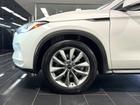 The 2021 Infiniti QX50 Luxe presents a compelling combination of power and sophistication with its e... (image 4)