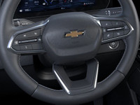 Under the prairie skies lies a stalwart companion, the 2025 Chevrolet Traverse LT AWD, dressed in a... (image 9)