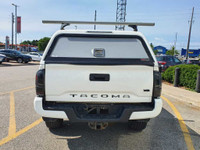 Check out this 2020 Toyota Tacoma 4x4 Double Cab Auto with 59,334 KMS, finished in a sleek White ext... (image 4)