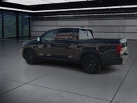 A rugged yet refined crew cab pickup with all-wheel drive and a 5.25 ft. box. The Black Edition incl... (image 5)
