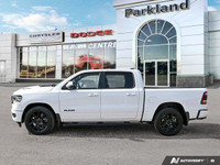 This 2023 Ram 1500 Sport Crew Cab 4x4 boasts a commanding presence with its Bright White exterior an... (image 2)