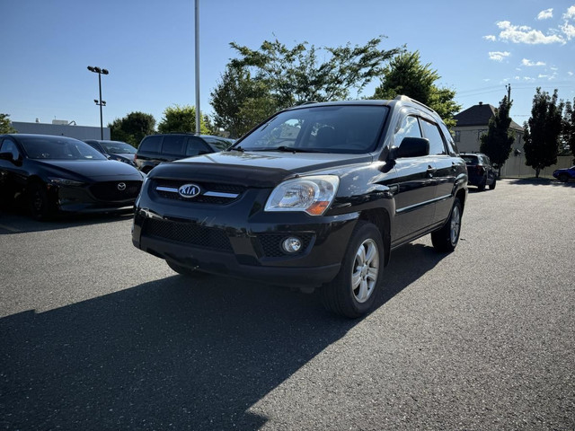 KIA Sportage Modèle Auto LX à quatre portes, moteur I4 à tractio in Cars & Trucks in Longueuil / South Shore