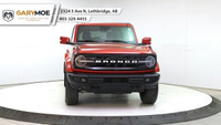 Experience the power and style of the red 2023 Ford Bronco Outer Banks 4 Door Advanced 4x4, boasting... (image 7)