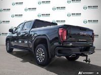 The pre-owned *2022 GMC Sierra 1500 AT4* is a rugged and refined pickup designed for drivers who nee... (image 4)