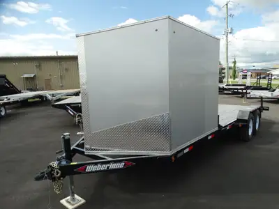 Come check out this unique flatbed trailer. This trailer has 16in. of flat deck space + a 6in. enclo...