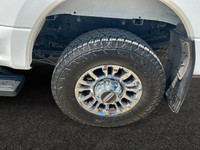 Looking for towing power and a truck that packs a punch? This WHITE Ford Super Duty pickups offer a... (image 8)