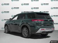 The 2023 Nissan Pathfinder SL 4WD in a stunning green finish perfectly combines rugged 4x4 capabilit... (image 4)