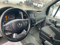 The 2015 Mercedes-Benz Sprinter Passenger Van with its 2.1L turbo-diesel engine is a rolling party b... (image 7)