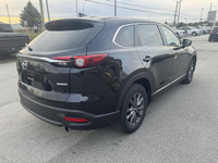 Elevate your drive with the 2023 Mazda CX-9 GS, a three-row SUV that combines luxury, performance, a... (image 4)