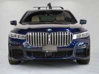 This sophisticated 2020 BMW 750i blends flagship luxury with commanding performance, finished in a d... (image 5)