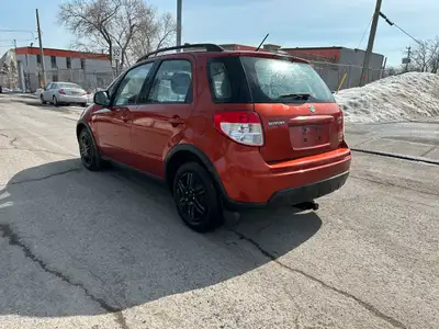 Engine: Moteur à 4 cylindres 2.0L/122CI L/100Km City: 9.3 L/100Km Hwy: 6.7