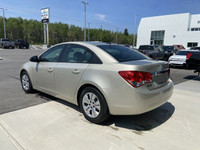 The 2014 Chevrolet Cruze 1LS offers a practical and efficient driving experience in a compact sedan.... (image 5)