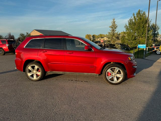 2015 Jeep Grand Cherokee SRT 4X4 6.4-liter HEMI V8 engine. 475 H in Cars & Trucks in Calgary