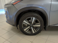 Fire up our 2023 Nissan Rogue SL AWD in Boulder Gray, and you'll find it's ready for adventures with... (image 9)