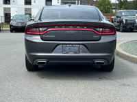This 2018 Dodge Charger SXT has a Grey Exterior and Cream Interior with seating for 5. Equipped with... (image 5)