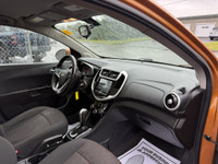 ONE OWNER This 2017 Chevrolet Sonic LT Auto 4dr Hatchback in vibrant orange is sure to turn heads! W... (image 6)