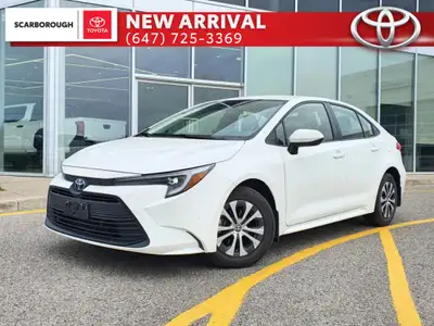 Check out this 2023 Toyota Corolla Hybrid LE CVT with 27,670 KMS, finished in a sleek White exterior...