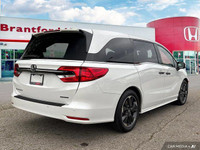 The 2022 Honda Odyssey Touring offers unparalleled versatility and family-friendly features. With on... (image 5)