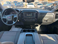 The 2018 GMC Sierra 1500 LT Crew Cab in black is a full-size pickup that combines rugged capability... (image 3)