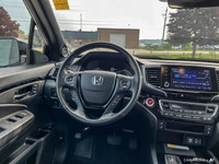 Recent Arrival! Looking for a reliable truck that isn't too big? Then check out this 2023 Honda Ridg... (image 9)