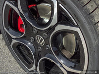 The 2025 Volkswagen Golf GTI in a striking white finish is a front-wheel-drive dynamo engineered to... (image 6)