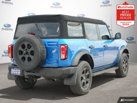 New Price! Odometer is 20559 kilometers below market average! Velocity Blue Metallic 2023 Ford Bronc... (image 4)
