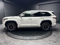 The elegance of White paired with a stately Black interior, the 2024 Toyota Sequoia TRD Off-Road awa... (image 6)
