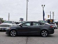 The 2015 Ford Fusion is a sleek, midsize sedan that offers a perfect blend of style, efficiency, and... (image 3)
