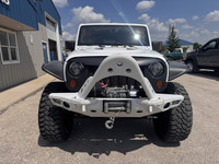 2013 Jeep Wrangler Unlimited Sahara 4x4 for sale at Pacific Motors near Winnipeg, MB DISCLAIMER: THI... (image 1)
