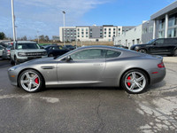 Experience luxury and performance with our exquisite Silver Aston Martin DB9 2dr Coupe Automatic. De... (image 1)