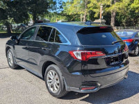 Strong acceleration and fuel economy from standard V6 engine high-mounted rear seat provides generou... (image 2)