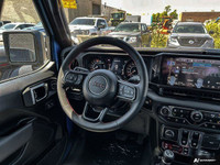 This Jeep Wrangler has a trusty Regular Unleaded V-6 3.6 L/220 engine powering this Manual transmiss... (image 8)